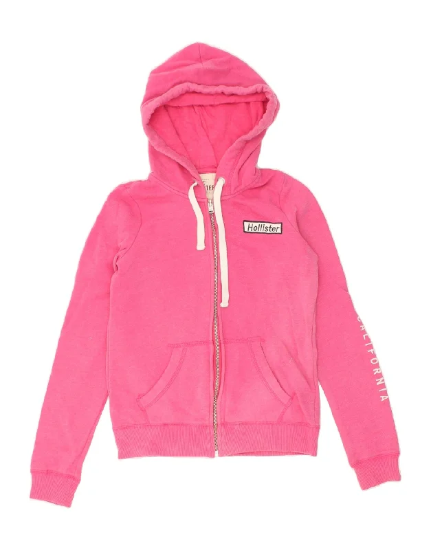 HOLLISTER Womens Graphic Zip Hoodie Sweater UK 6 XS Pink Cotton Front Pockets Side Pockets Patch Pockets HOLLISTER Womens Graphic Zip Hoodie Sweater UK 6 XS Pink Cotton Front Pockets Side Pockets Patch Pockets